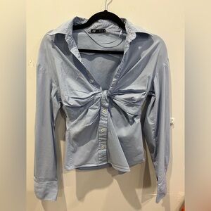 Long Sleeve Light Blue Shirt with Twisted Neck